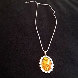 Silver pendant  with yellow  little  flowers